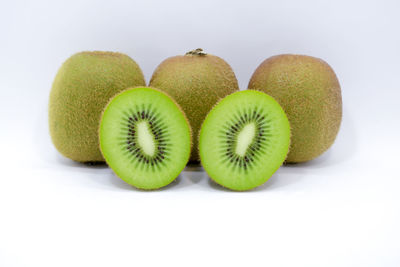 Close-up of fruits against white background