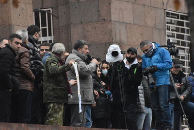 Group of people in front of building