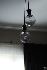 Close-up of light bulb hanging