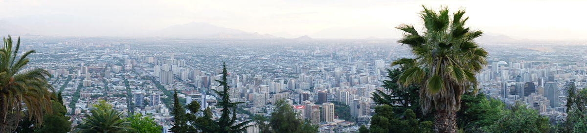 Panoramic shot of cityscape against sky