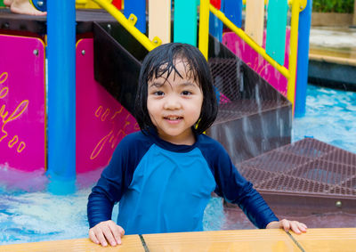 Portrait of a smiling girl standing on beach