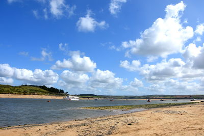 Scenic view of beach against sky