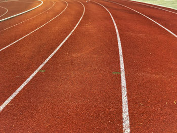 Empty running track at stadium