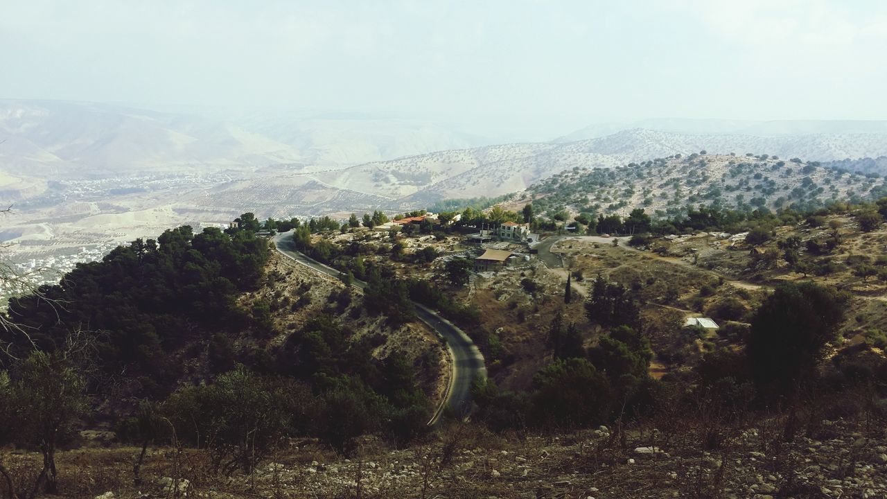 landscape, environment, plant, tree, sky, beauty in nature, scenics - nature, land, no people, nature, day, tranquil scene, mountain, architecture, field, non-urban scene, high angle view, tranquility, built structure, building exterior, outdoors