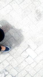 High angle view of man standing on road