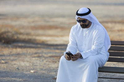 Portrait of man standing on land