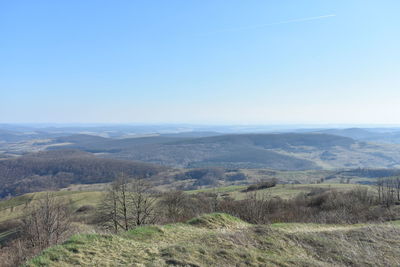 Scenic view of landscape against clear blue sky