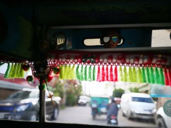 Close-up of cars on road