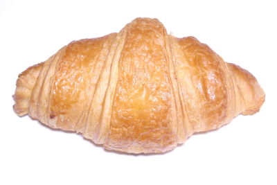 Close-up of bread against white background