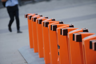 Row of people walking on wood