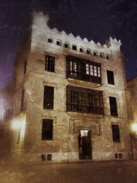 Illuminated building at night