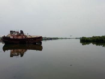 Scenic view of lake against clear sky