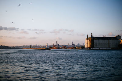 View of sea with city in background