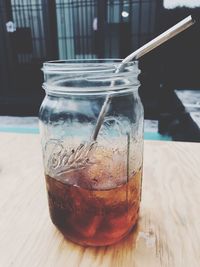 Close-up of glass of jar on table