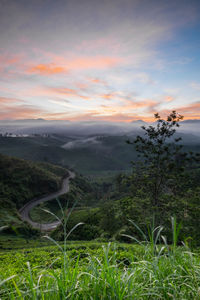 Scenic view of landscape against sky during sunset