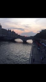View of bridge over river in city