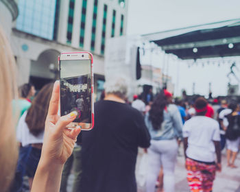 People photographing in city