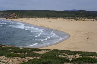 Scenic view of beach against sky, praia da bordeira