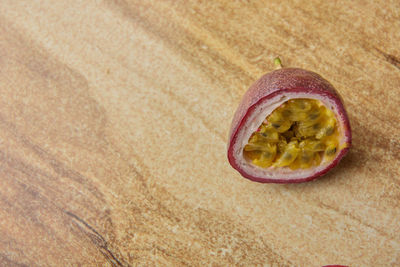 Close-up of fruit on beach