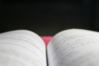 Close-up of text on book