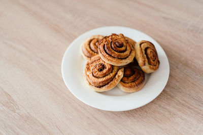 High angle view of cookies in plate on table