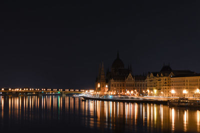 Illuminated city lit up at night