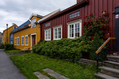 View of residential building against cloudy sky