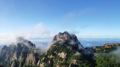 Panoramic view of landscape and mountains against sky