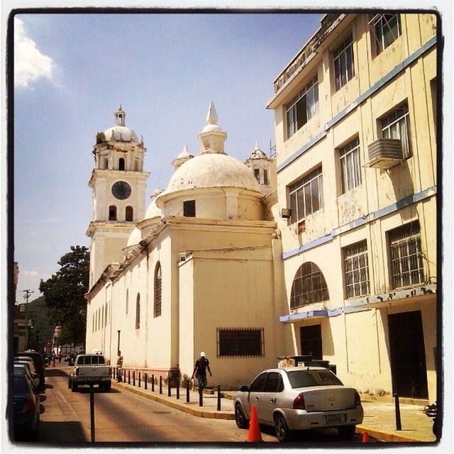 building exterior, architecture, built structure, church, religion, place of worship, spirituality, transportation, transfer print, dome, sky, cathedral, car, travel, incidental people, facade, street