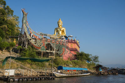 Statue of temple against clear sky