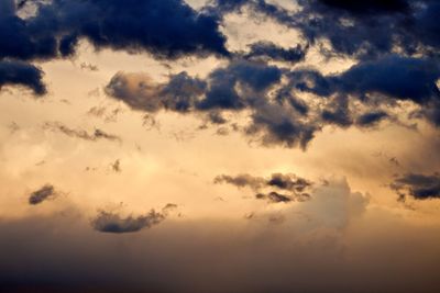 Low angle view of clouds in sky during sunset