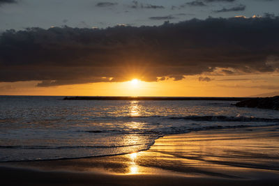 Scenic view of sea against sky during sunset