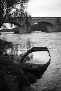 Bridge over river against sky
