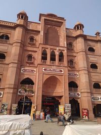 Group of people in front of building