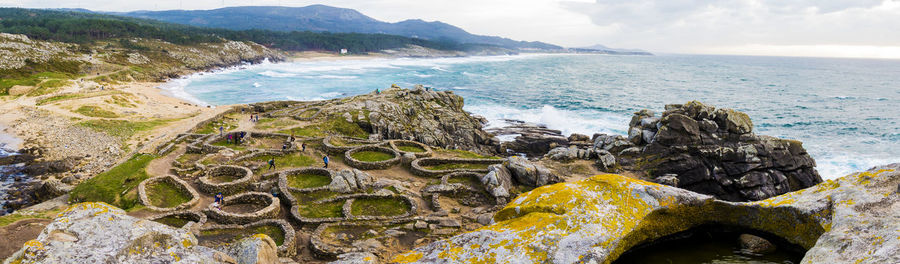 Panoramic view of castro de barona by sea