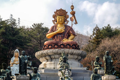 Low angle view of statue against sky