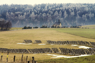 Czech republic germany relations statue in the moravian sudetes in early spring trees covered in ice