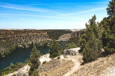 Scenic view of river against sky