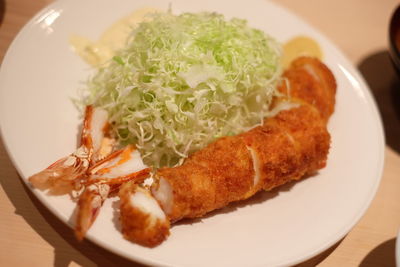 Close-up of food served in plate on table