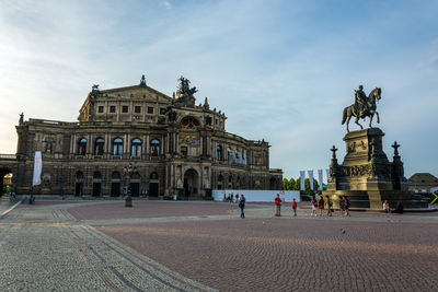 Group of people in front of building