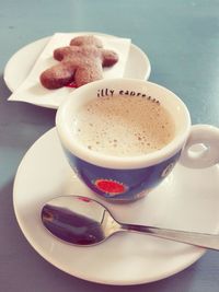 Close-up of coffee cup on table