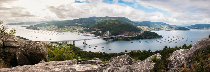 Panorama view of the ria de vigo estuary from redondela on a cloudy summer afternoon.