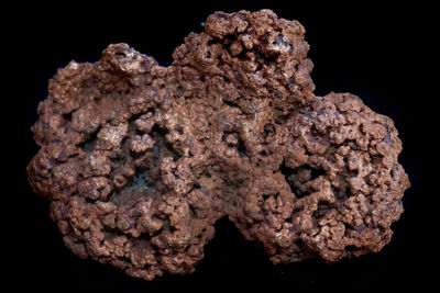 Close-up of ice cream over black background