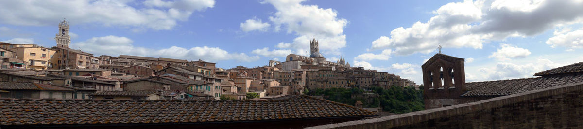 Panoramic view of city against sky