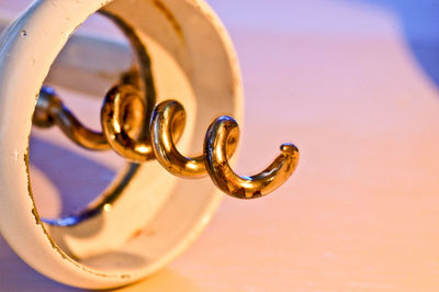 Close-up of wedding rings on metal