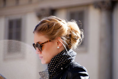 Side view of young woman