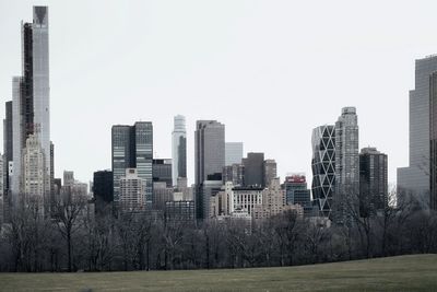 Modern buildings against clear sky