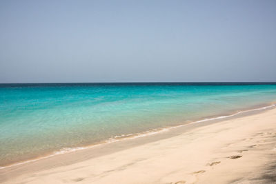 Scenic view of sea against clear sky