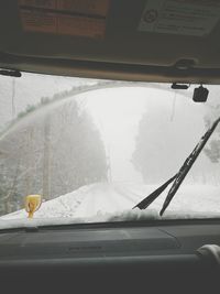 Close-up of car on snow