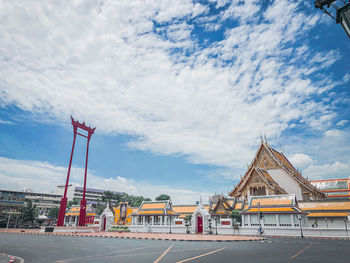 View of buildings against cloudy sky